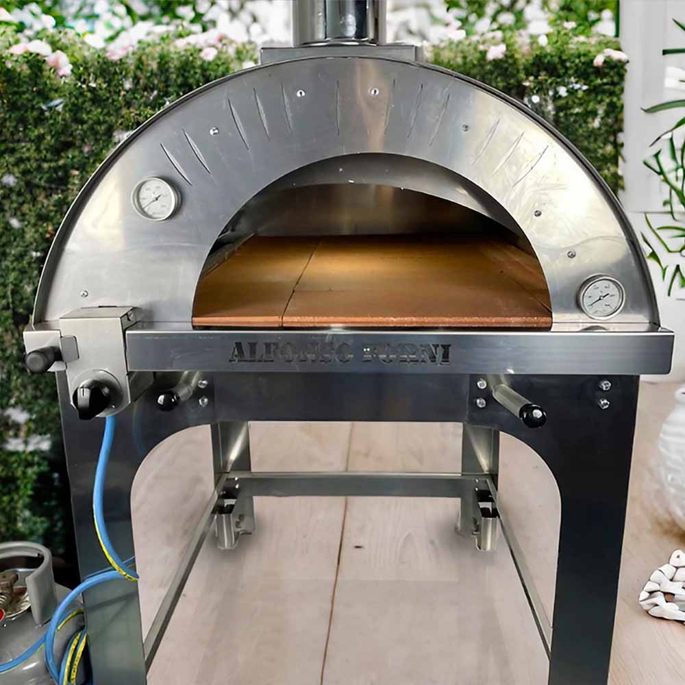 La distribuzione uniforme del calore nel Forno ibrido a legna/gas Alfonso 6 Pizze con carrello